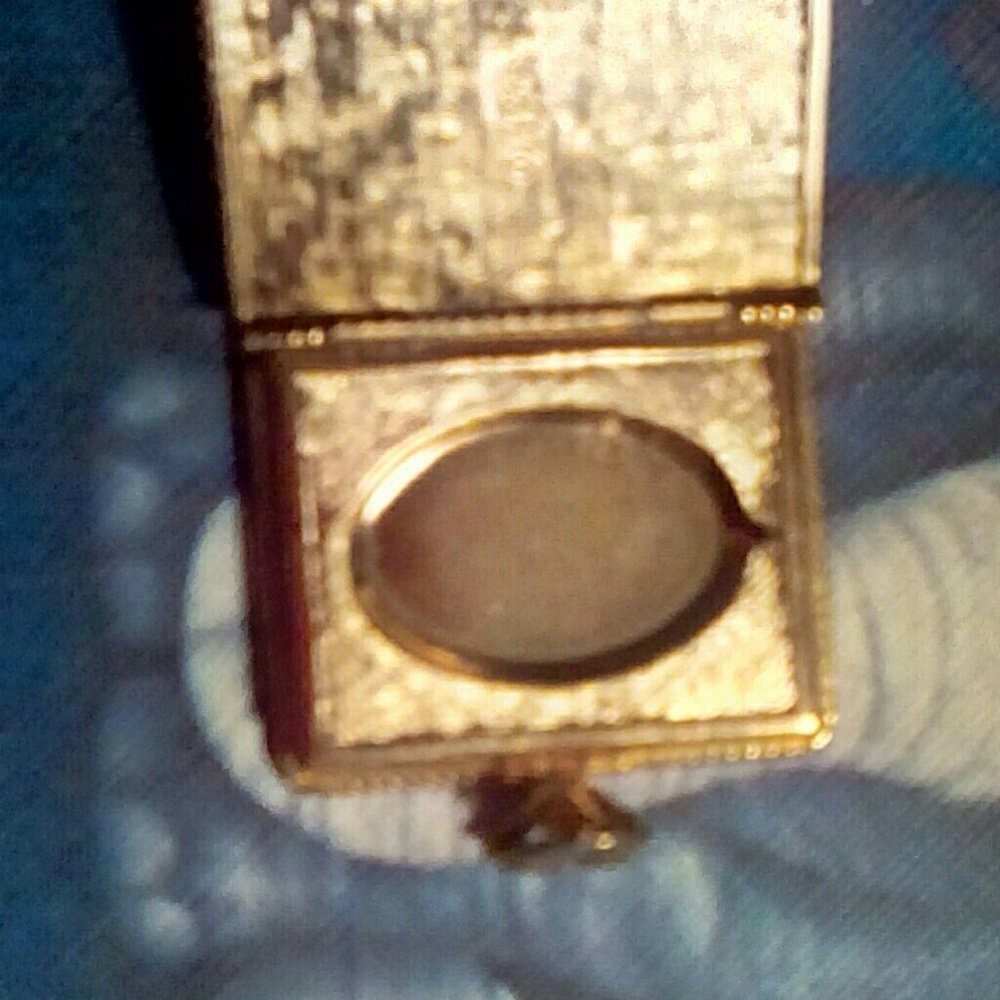 Avon locket